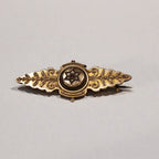 9YG 2.6G SEED PEARL & GARNET BAR BROOCH
