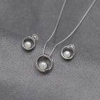 SILVER OPEN CIRCLE PEARL STUD EARRINGS