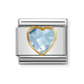 NOM HEART CZ LIGHT BLUE 18YG - OVAL CZ