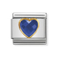 NOM HEART CZ BLUE 18YG - OVAL CZ