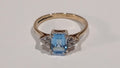 Ladies 9ct Rectangular Blue Topaz & Cz Ring