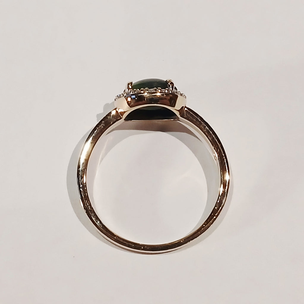 9YG GREEN CABOCHON & DIAMOND CLAW SET HALO RING