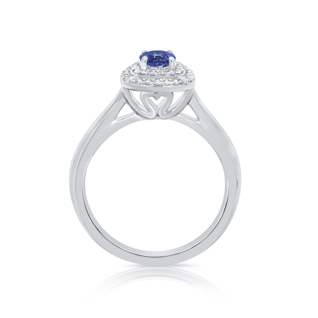 9CT WG OVAL TANZANITE & 0.14CTS DIAMOND CLAW SET RING