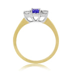 9CT YG OVAL TANZANITE & 2 DIAMOND CLAW SET RING