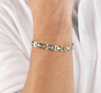 1580793 | GNTS STEEL & GOLD TONE SATIN CENTRE BOSS BRACELET