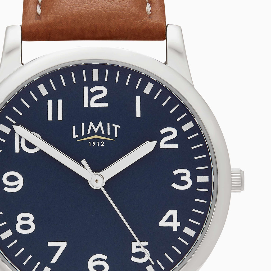 GENTS LIMIT WM RND BLUE DL. TAN STRAP WATCH