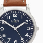 GENTS LIMIT WM RND BLUE DL. TAN STRAP WATCH