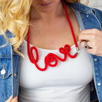 RED THE "LOVE" WORD NECKLET WITH MAGNET CLASP