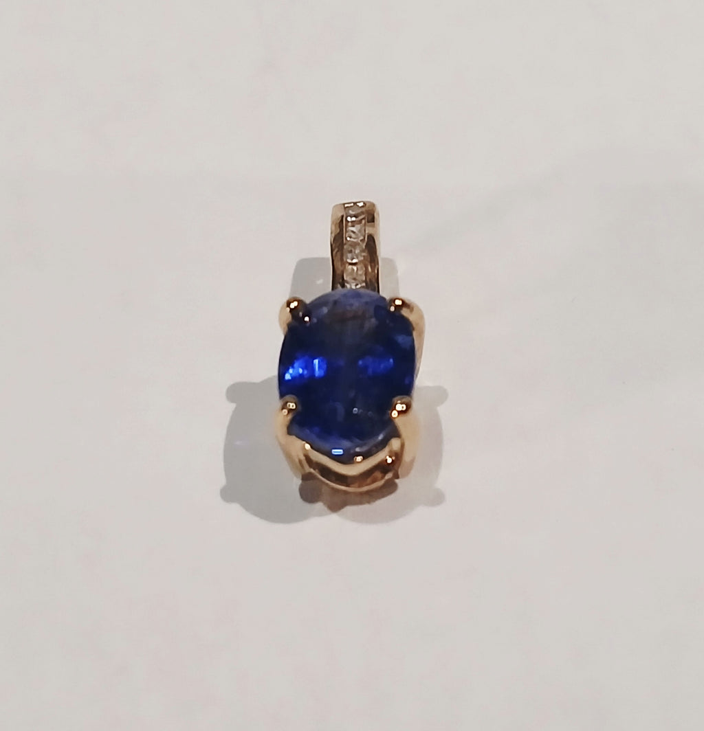 9YG 0.6G OVAL TANZ & DIAMOND SET PENDANT - PRE OWNED