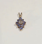 9CT YELLOW GOLD 0.7G 8 RND TANZ & DIA CLUSTER PEND - | PREOWNED