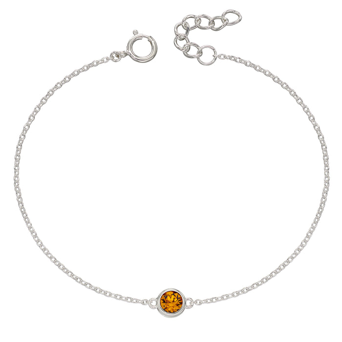SILVER RND NOVEMBER ORNG CZ RUB SET TRACE BRACELET