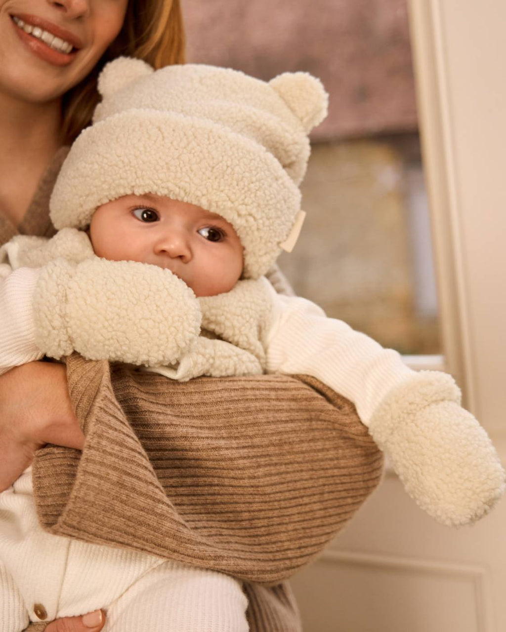 OFF WHITE BORG BABY HAT & MITTENS by KATIE LOXTON