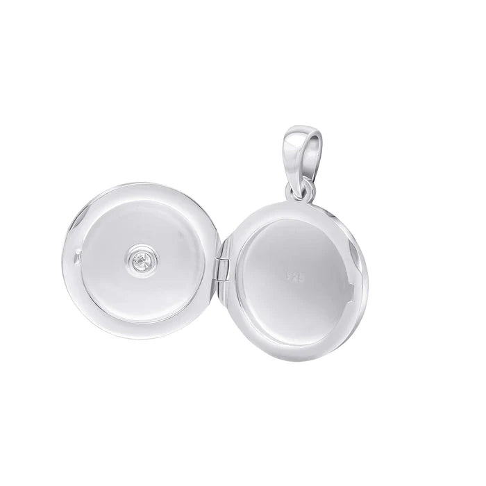SILVER ROUND SHAPE RUB SET CZ STARBURST LOCKET