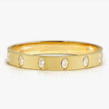 029537/020 NOMINATION WIDE STEEL GOLD TONE SATIN FINISH OVAL WHT CZ SMALL SIZE PRETTY BANGLE