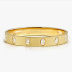 029537/020 NOMINATION WIDE STEEL GOLD TONE SATIN FINISH OVAL WHT CZ SMALL SIZE PRETTY BANGLE