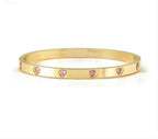 029529/021 NOMINATION STEEL GOLD FINISH PNK CZ HEART MEDIUM SIZE PRETTY BANGLE